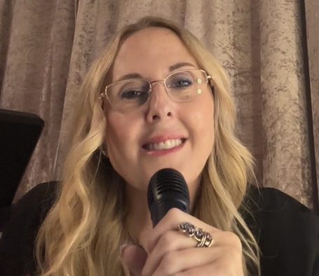Caroline Singing with a Microphone Singing with a Microphone